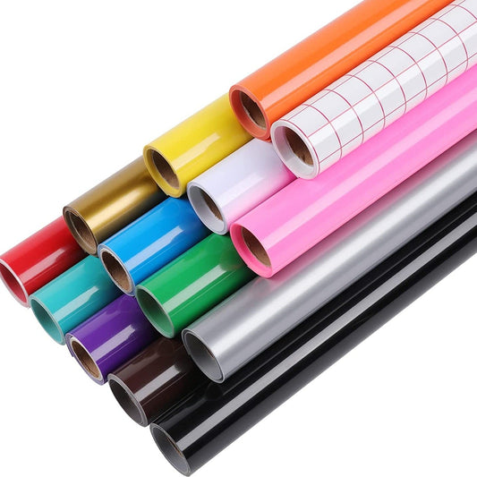 Assorted rolls of colorful vinyl or adhesive paper on a white background