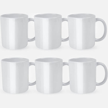 Set of six white mugs on a light gray background